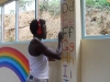 OMARI PAINTING THE CLASSROOM