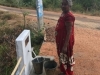 MORAWEWA-LADY-COLLECTING-WATER